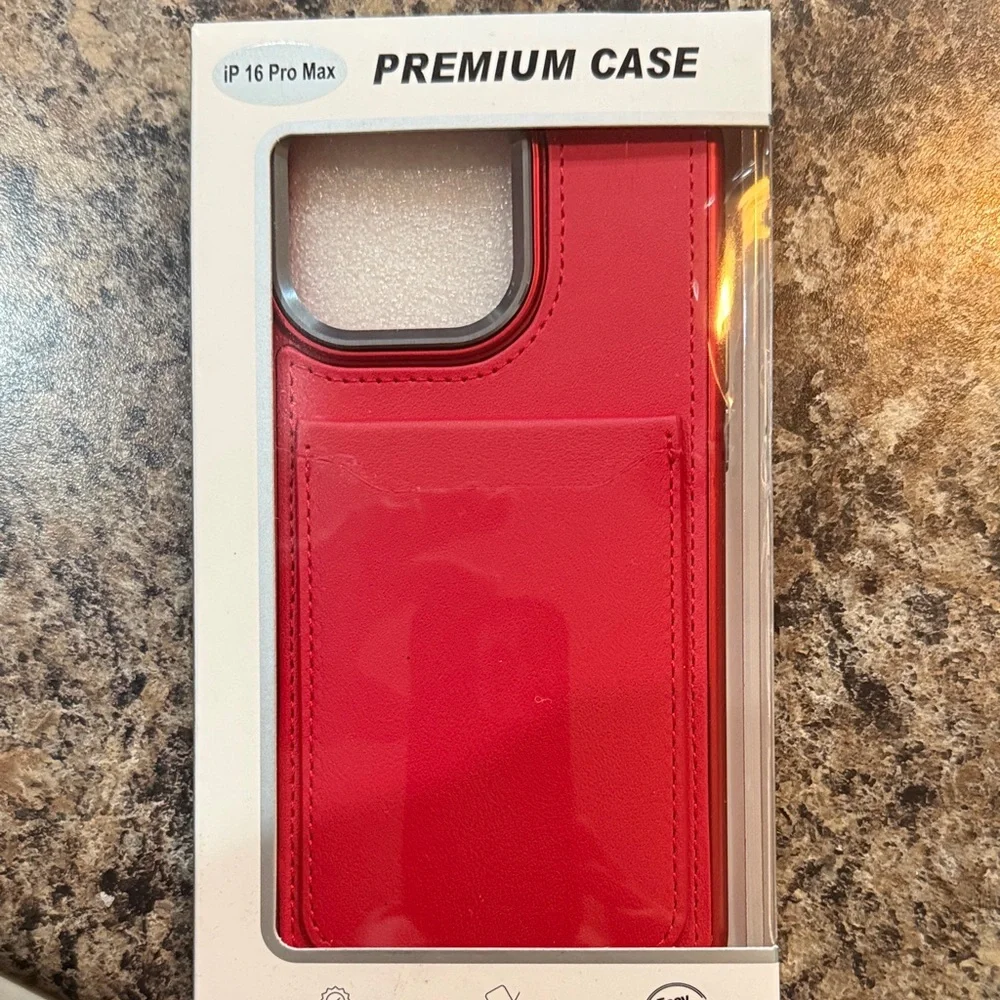 #94 Red and Blue IPhone 16 Pro Max and a Bling out 16 Pro Max Cover.